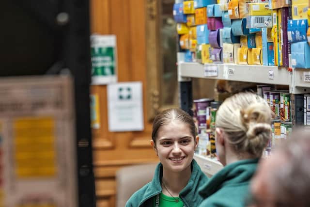Volunteers pack emergency food parcels