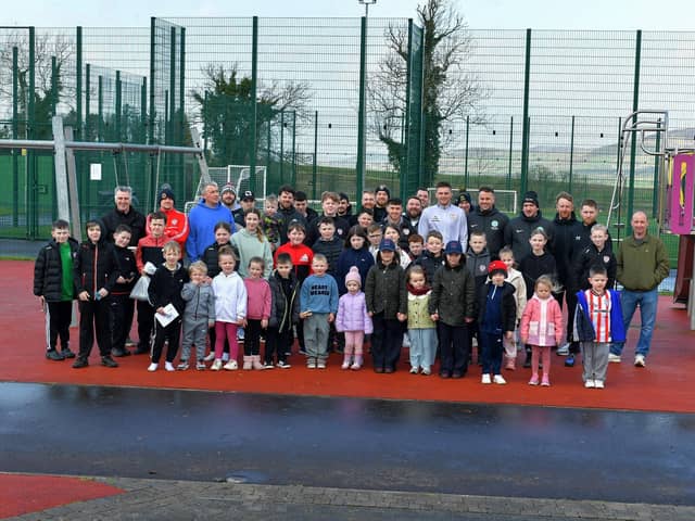 Group pictured with Derry City players Adam O’Reilly and Hayden Cann  at the Ballymac Celtic Fun Day in aid of Foyle Search and Rescue. Photograph: George Sweeney.