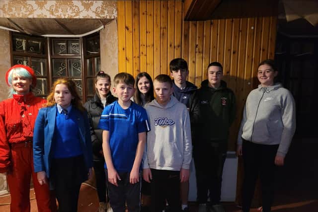 Cara Park, Youth Leader in Charge of Club Óige Setanta with some of the young people who will be taking part in the haunted house.
