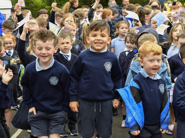 Happy pupils from Rosemount Primary School enjoy the entertainment from the Jive Aces on Thursday morning. Photo: George Sweeney