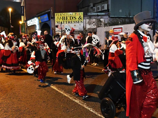 The ‘Carnival of the Dead’ Halloween parade makes its way along Strand Road. Photo: George Sweeney