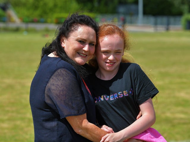 Pupil with her mum at the Holy Child Primary School sports day held on Monday last. Photo: George Sweeney. DER2325GS – 008