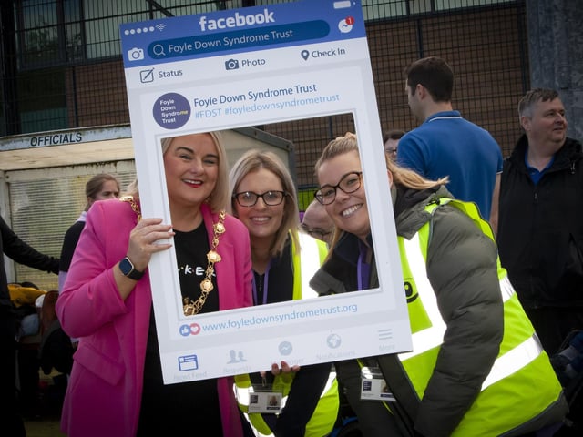 The Mayor Sandra Duffy pictured with some of the staff from the Foyle Down Syndrome Trust during Friday’s tournament.