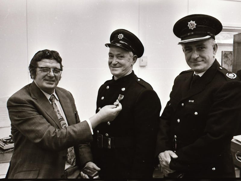 Presentation of Fire Brigade long service medal.