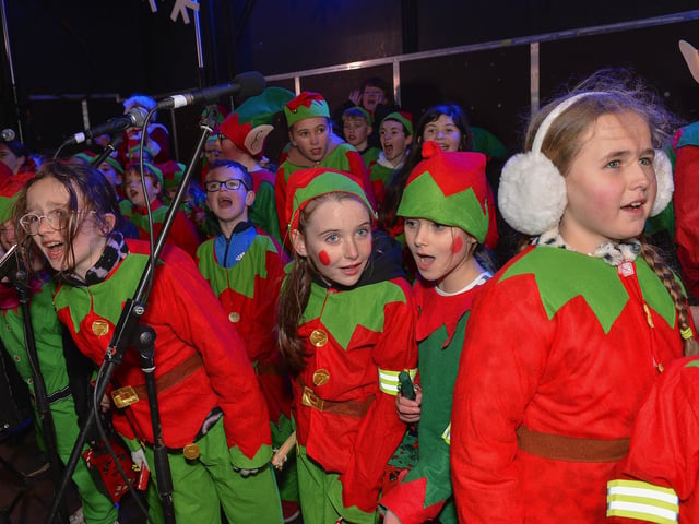 Children from Culmore Kids Club sing Christmas carols at the Culmore Community Hub on Friday night. Photo: George Sweeney