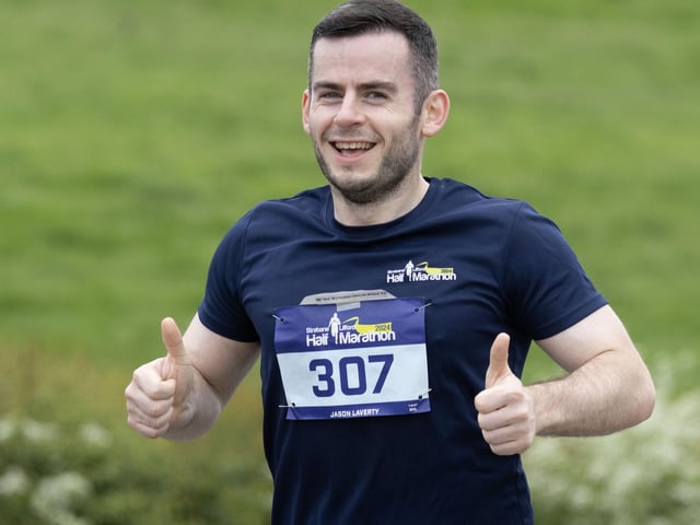 Jason Lafferty enjoying the sunshine during the Half Marathon. (North West Newspix)