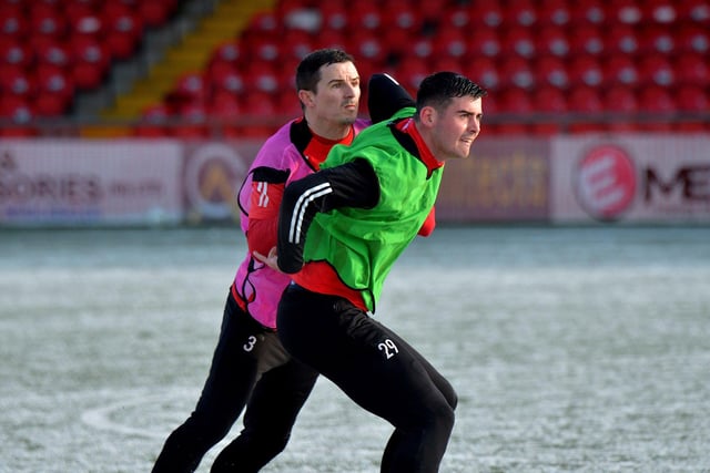 Derry City’s Ciaran Coll and Cian Kavanagh tussle during Monday’s training session at the Brandywell. Picture by George Sweeney. DER2304GS-10