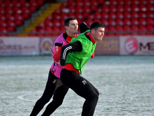 Derry City’s Ciaran Coll and Cian Kavanagh tussle during Monday’s training session at the Brandywell. Picture by George Sweeney. DER2304GS-10