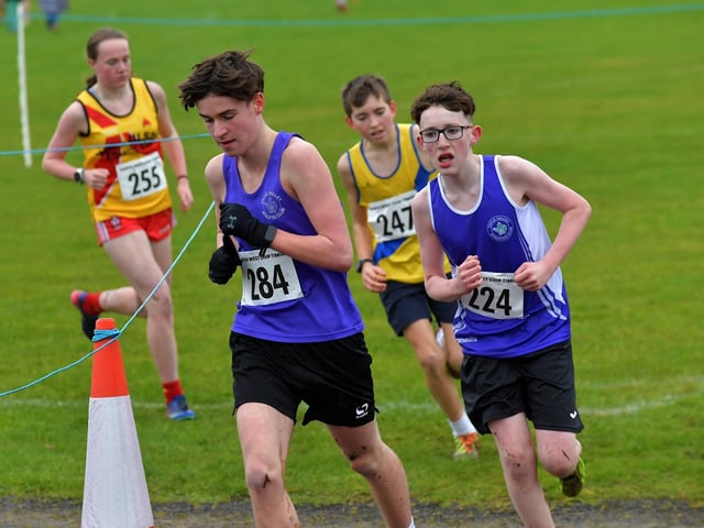 Foyle Valley’s Eoin Wilson (284) and Thomas Logue (224) competing in the U15/U17 3k race at Thornhill College. Photo: George Sweeney