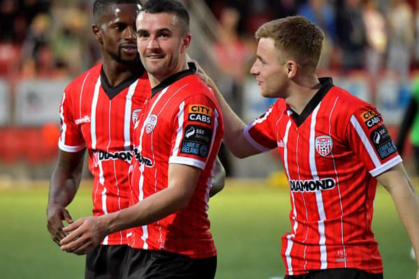 Derry City players Sadou Diallo, Michael Duffy and Brandon Kavanagh celebrate Derry City’s win over KuPs FC. Photo: George Sweeney. DER2330GS -