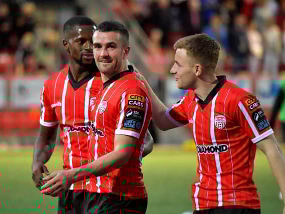 Derry City players Sadou Diallo, Michael Duffy and Brandon Kavanagh celebrate Derry City’s win over KuPs FC. Photo: George Sweeney. DER2330GS -