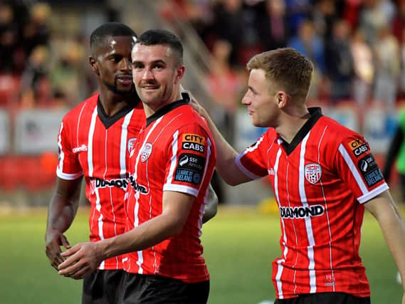 Derry City players Sadou Diallo, Michael Duffy and Brandon Kavanagh celebrate Derry City’s win over KuPs FC. Photo: George Sweeney. DER2330GS -