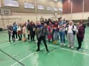Derry star Micky Doherty with participants at the special event to recognise the achievements of young people in care.