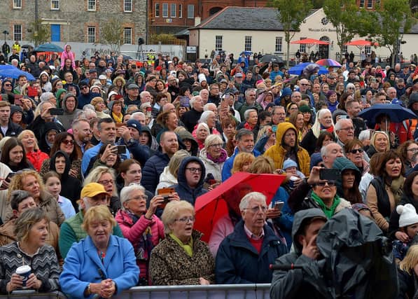 Some of the large attendance at Ebrington Square for Phil Coulter’s live performance of his iconic hit ‘The Town I Loved So Well' on Saturday afternoon last. Photo: George Sweeney. DER2240GS – 13