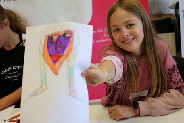 Ellie with the colourful design she created with the help of artist Estefania Baena Navarro.