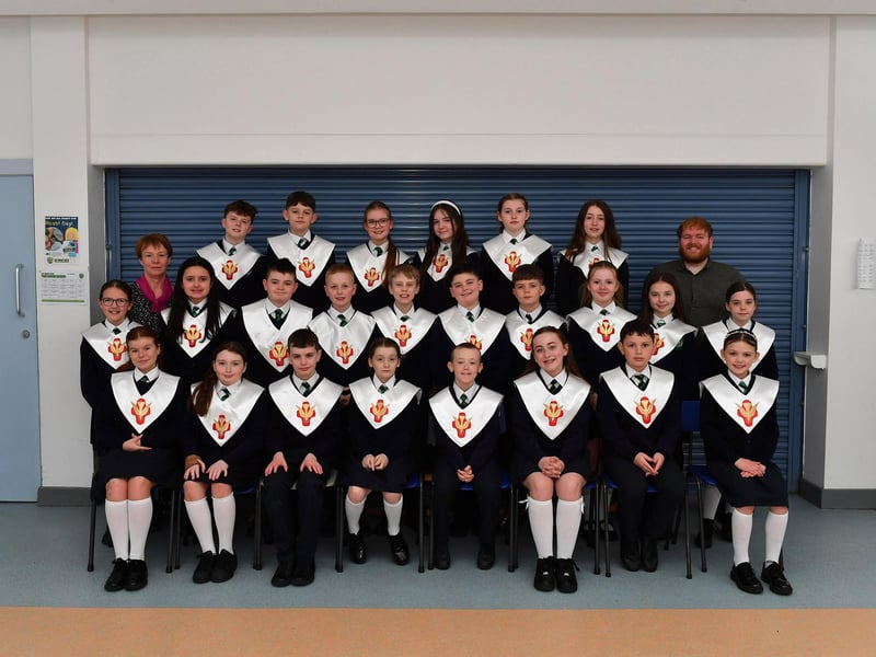 St Patrick’s Primary School teacher Mrs C. McConnell (on the left) with her P7 class who were confirmed by Fr. D. Mc Grattan in Pennyburn Church on 7th March. Included in the photograph is teaching placement Mr. P. Ceallaigh. Photo: George Sweeney