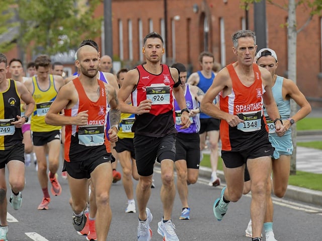 First Wave runners in the Waterside Half Marathon make their way out of Ebrington Square towards Limavady Road. Photo: George Sweeney