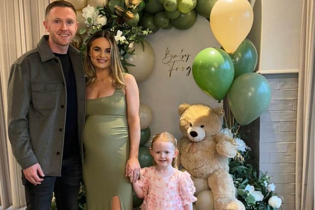 Shane Ferguson, his wife Grace and four year-old daughter Betsy Mae.