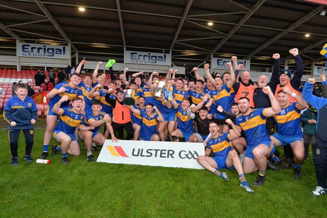 Naomh Padraig, Muff players and managers celebrate their historic Ulster Junior title in Celtic Park on Saturday. (Photo: George Sweeney)