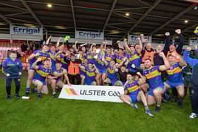 Naomh Padraig, Muff players and managers celebrate their historic Ulster Junior title in Celtic Park on Saturday. (Photo: George Sweeney)