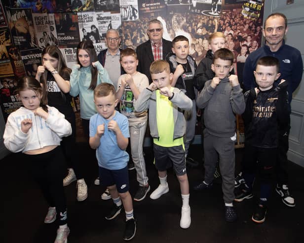 A number of the young boxers from Oakleaf BC pictured before Tuesday evening's premiere on their club at the Nerve Centre, Derry. Included are boxing supremos Edmund Donnelly, Eugene Duffy and club coach Eugene O'Kane, Junior. (Photos: Jim McCafferty Photography)