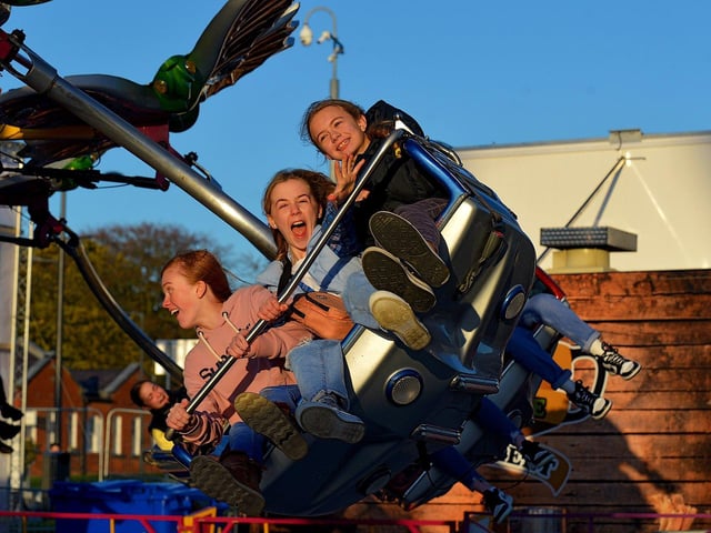 These girls enjoy the amusements at Cullen's Halloween Funfair in Ebrington Square. Photo: George Sweeney.  DER2243GS – 061