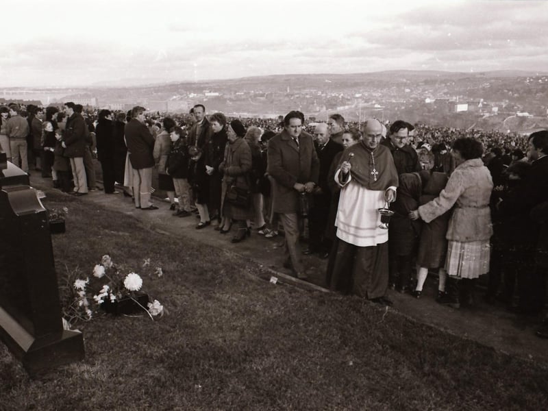 Bishop Edward Daly leads the ceremonies of Intercession for the Dead at the City Cemetery.