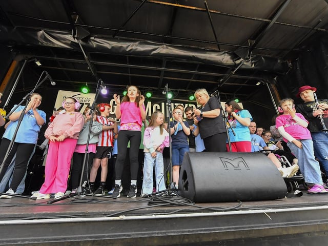 Ardnashee School choir and band play on stage, in Guildhall Square, on afternoon. Photo: George Sweeney