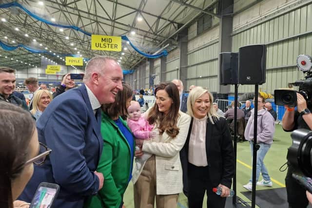 Newly returned Sinn Féin MP Órfhlaith Begley with her six-month-old baby daughter and party colleagues at the count centre.