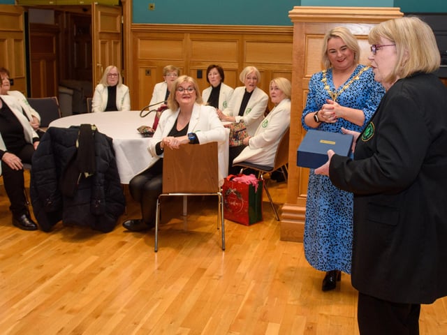 The Mayor Councillor Sandra Duffy pictured with Musicial Director, Sheila Carlin as she welcomed the members of Colmcille Ladies Choir to a reception in the Guildhall as they mark their 50th Anniversary. Picture Martin McKeown. 20.01.23:.