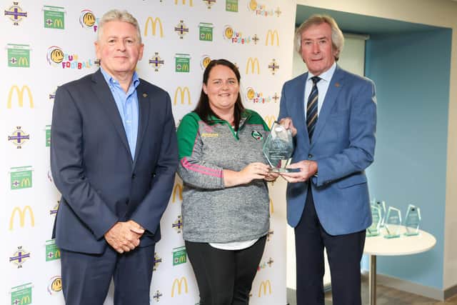 Fun Football Ambassador Pat Jennings, McDonald’s Franchisee John McCollum and Melanie McElhinney from Dungiven Celtic FC