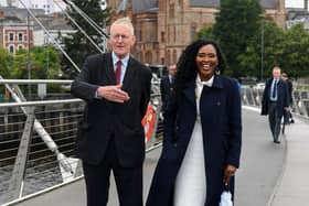 Hilary Benn MP, secretary of state for Northern Ireland, pictured with Mayor Lilian Seenoi Barr on the Peace Bridge during his visit to Derry on Thursday afternoon. Photo: George Sweeney