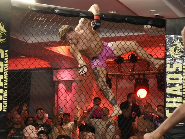Blaine McGill, FAI, celebrates his first MMA professional victory.
