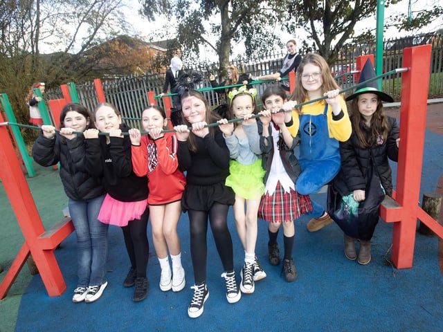 More P7 girls posing for a picture during Halloween Celebrations at Greenhaw PS on Friday. : .
