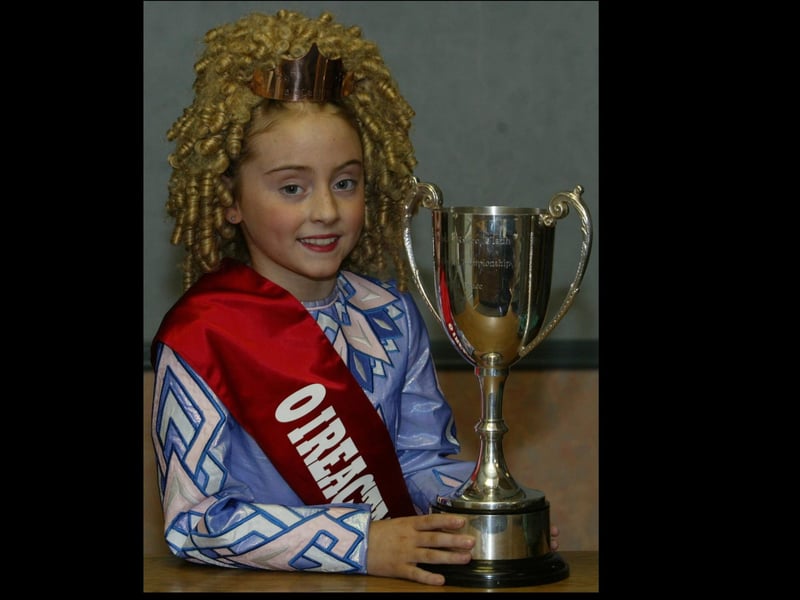 Megan Ryan from Carnhill who won the under 9 Ulster Championship which was held in Derry recently. Megan is a pupil of the McConomy school of Dance. (2111JB20):These Irish Dancing champions were featured in the 'Journal' in 2003 marking their achievements.