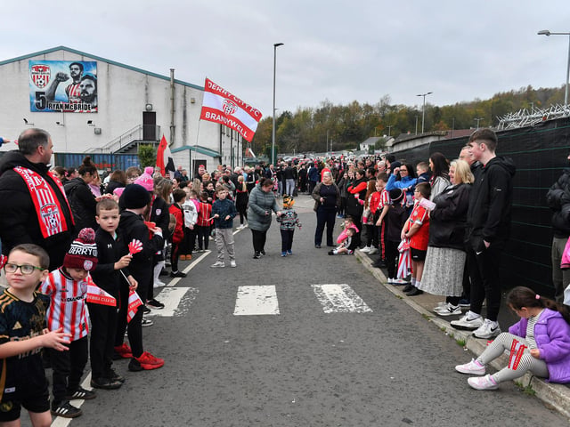 Derry City fans at the Brandywell Stadium on Saturday morning prior to the team’s departure for Dublin ahead of Sunday’s FAI Cup Final against Drogheda United. Photograph: George Sweeney