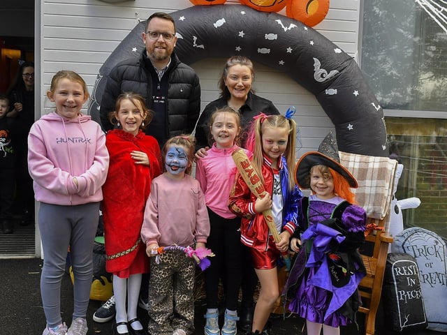 Gary Middleton MLA and Mrs Tina Lyons, school principal, pictured with pupils at the Autumn Festival with Pumpkin Patch at St Columba’s Primary School, Newbuildings, on Saturday afternoon last. Photo: George Sweeney