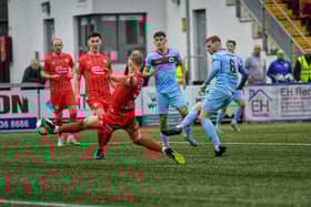 Institute's Evan Tweed scores a first half goal against Portadown. Photograph: George Sweeney