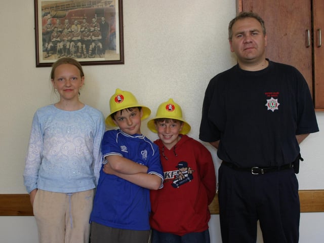 Fire service helmets on.