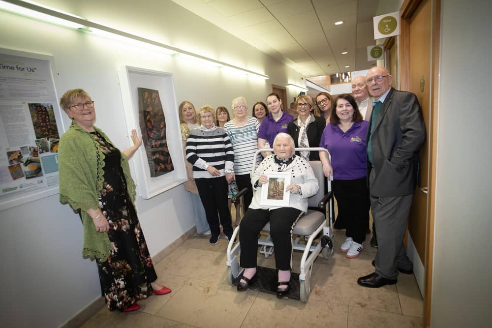 Artist Maureen McGhee pictured with staff and patrons of Old Library Trust DEEDS during the unveiling of her beautiful new artwork at the North West Cancer Centre in Altnagelvin Area Hospital on Friday morning last.