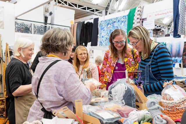 Group of visitors shopping for Crochet