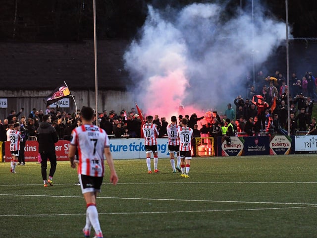 Derry City players and fans celebrate their FAI Cup quarter-final win over Shelbourne. Photograph: George Sweeney