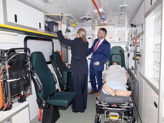 Dr Andrea Shepherd, Deputy Head of School of Nursing and Paramedic Science at Ulster University, and Health Minister Robbie Butler MLA observing the simulated ambulance Derry campus as part of the specialist facilities nursing and paramedic students use in their training. The purpose-built simulated ambulance replicates the layout and environment of a real ambulance, giving students the opportunity to practise essential clinical skills and prepare for real-world emergency situations.