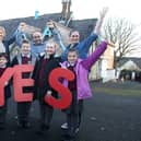 Pupils and staff at Culmore Primary School celebrating their successful parental ballot to transform to Integrated status. Photograph by Declan Roughan,