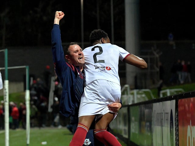 Assistant Manager Daire Doyle and goal scorer Elicha Ahul celebrate Drogheda United’s win over Derry City in the Brandywell. Photo: George Sweeney. DER2314GS – 17