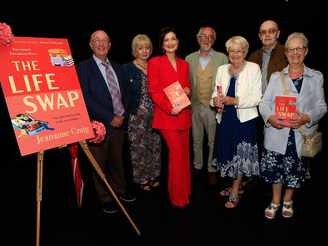 Jeananne Craig, author with dad Jim, uncles and aunts at the launch of her first novel, published by Hachette Books Ireland, “The Life Swap”. (Photo - Tom Heaney, nwpresspics)