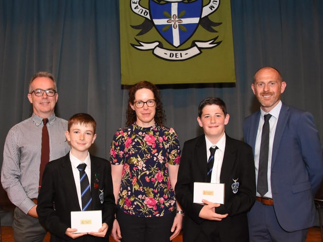 Group pictured at the Annual Prizegiving at St. Columb’s College - Mr T McGonigle, Senior Teacher and Mrs U Grimley, Senior Teacher pictured with Overall Academic Prizewinners 2022-2023 for Year 8 - Joseph Doherty, 8E and Charlie Ferry, 8A.