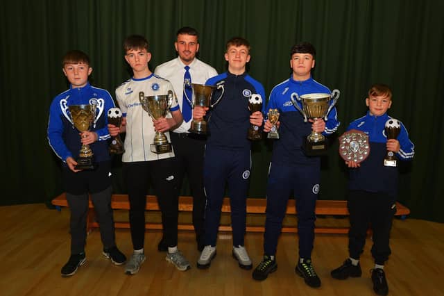 Vice-chairperson Diolain Ward pictured with award winners Andrew Gillespie, Charlie McLeary, Cillian Boyle, Jake Harley and Cormac Donnelly at the Trojans FC annual Youth Presentation held in St Cecilia’s College. Photo: George Sweeney