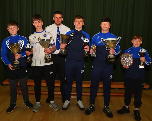 Vice-chairperson Diolain Ward pictured with award winners Andrew Gillespie, Charlie McLeary, Cillian Boyle, Jake Harley and Cormac Donnelly at the Trojans FC annual Youth Presentation held in St Cecilia’s College.  Photo: George Sweeney