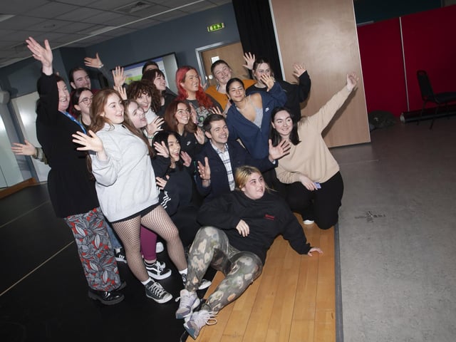 Dance students from the North West Regional College pose for a picture with Damian McGinty on Tuesday.
